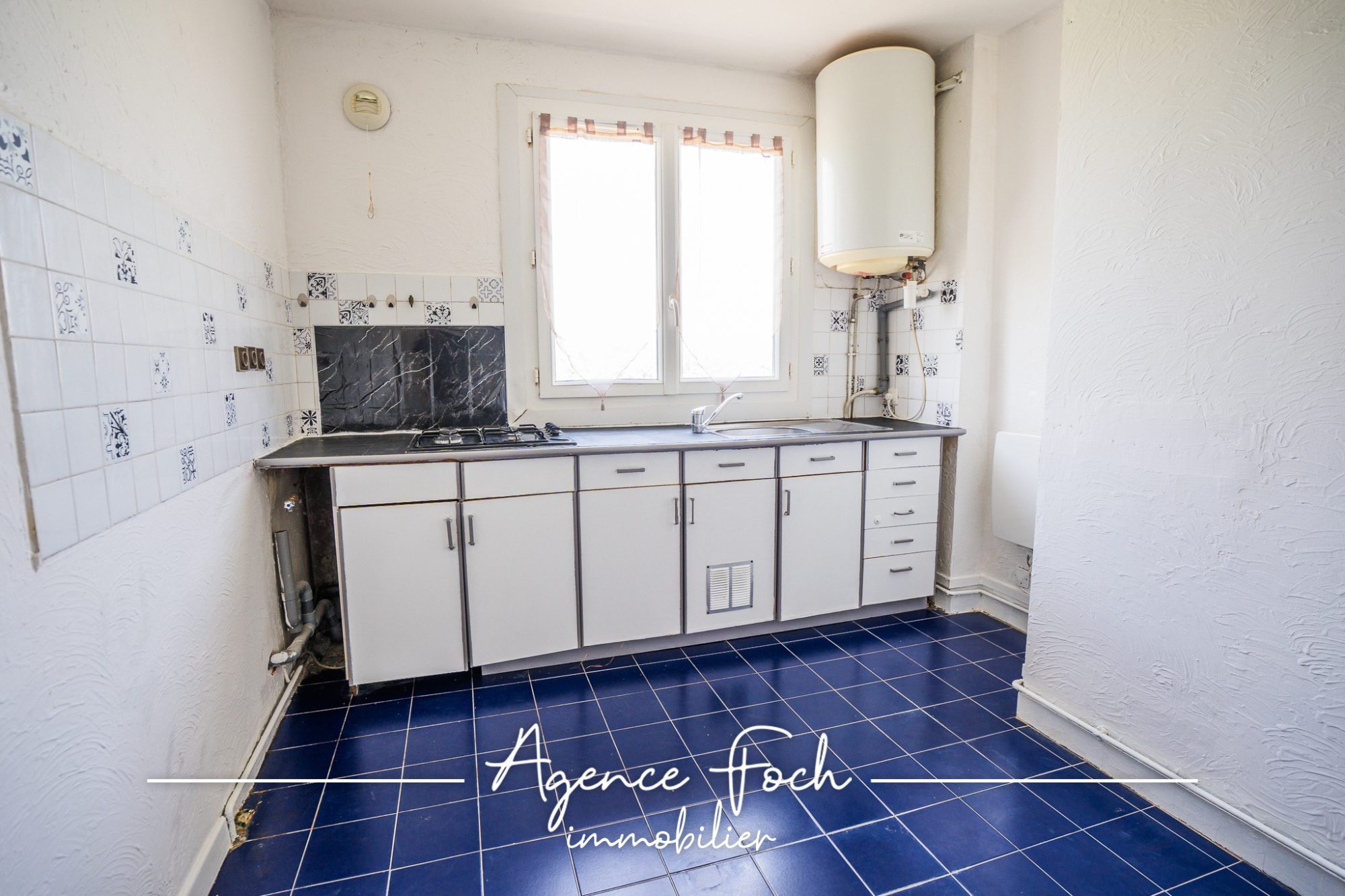 APPARTEMENT 3 PIECES AVEC BALCON ET CAVE – A RENOVER 3